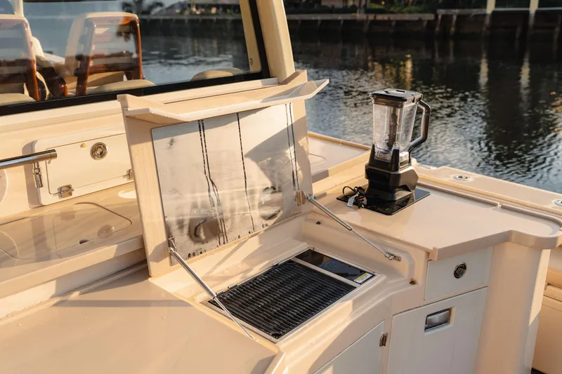  Yacht Photos Pics 2022 HCB 53 Sue&ntilde;os boat interior with a blender on the counter.