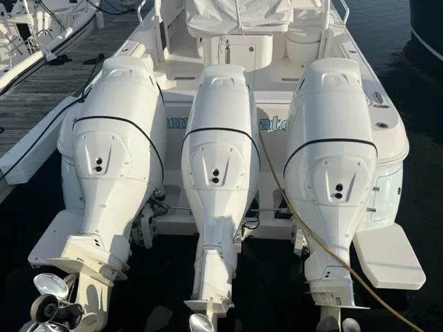  Yacht Photos Pics 2018 Intrepid 375 Walkaround with triple outboard engines docked.