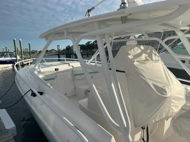  Yacht Photos Pics 2018 Intrepid 375 Walkaround boat docked at marina.