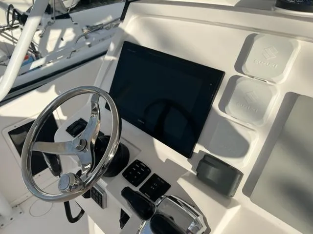  Yacht Photos Pics 2018 Intrepid 375 Walkaround helm with steering wheel and control panel.