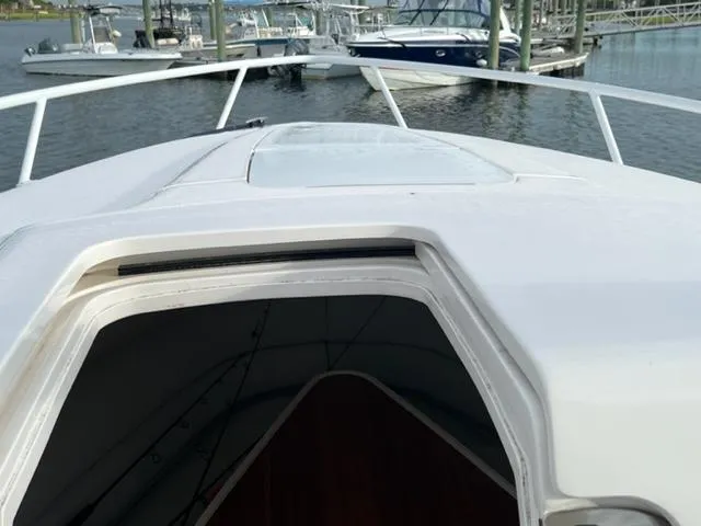  Yacht Photos Pics 2018 Intrepid 375 Walkaround boat bow with open cabin hatch.