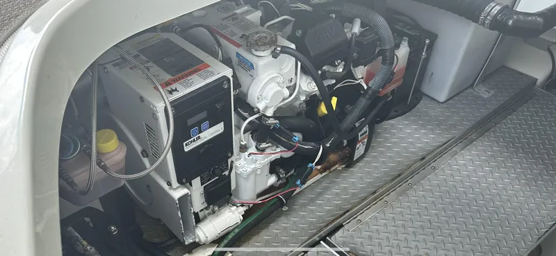  Yacht Photos Pics Engine compartment of a 2018 Formula 370 Super Sport boat, featuring a Kohler generator.