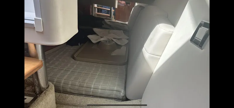  Yacht Photos Pics Interior cabin of a 2018 Formula 370 Super Sport boat, featuring seating and storage.