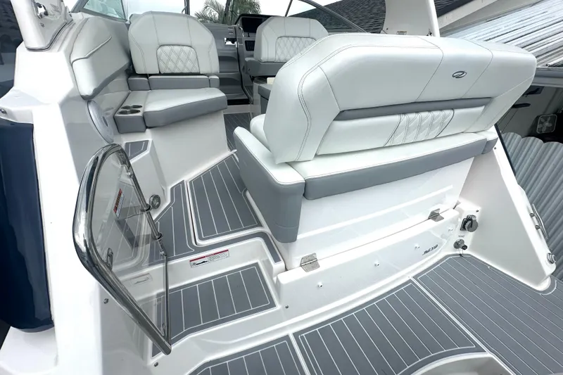  Yacht Photos Pics Luxurious interior of 2025 Regal 26 XO boat with elegant seating and modern design.