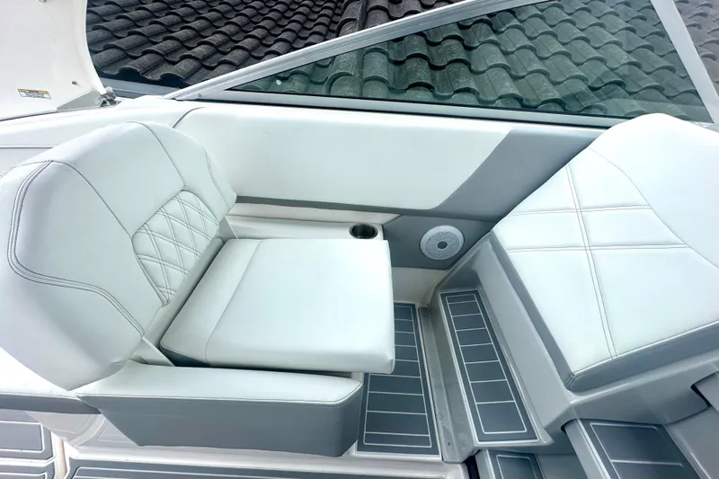  Yacht Photos Pics 2025 Regal 26 XO boat interior with white leather seating and modern design.