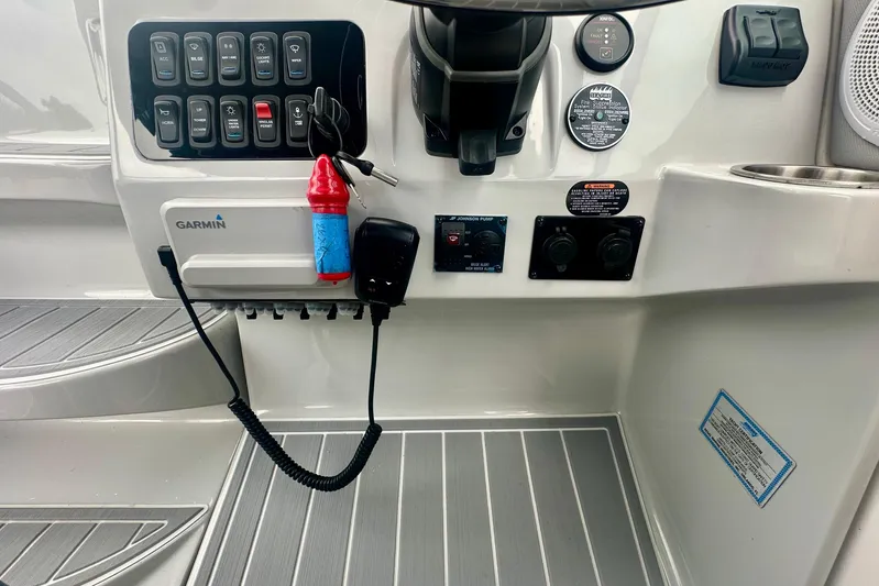  Yacht Photos Pics Control panel of 2025 Regal 26 XO boat with Garmin electronics and switches.