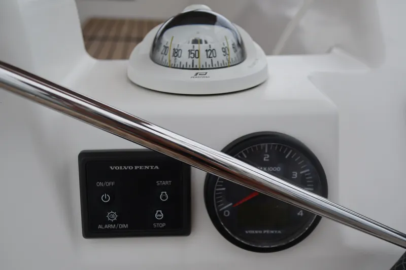  Yacht Photos Pics Control panel of 2016 Dufour 382 Grand Large sailboat with compass and gauges.