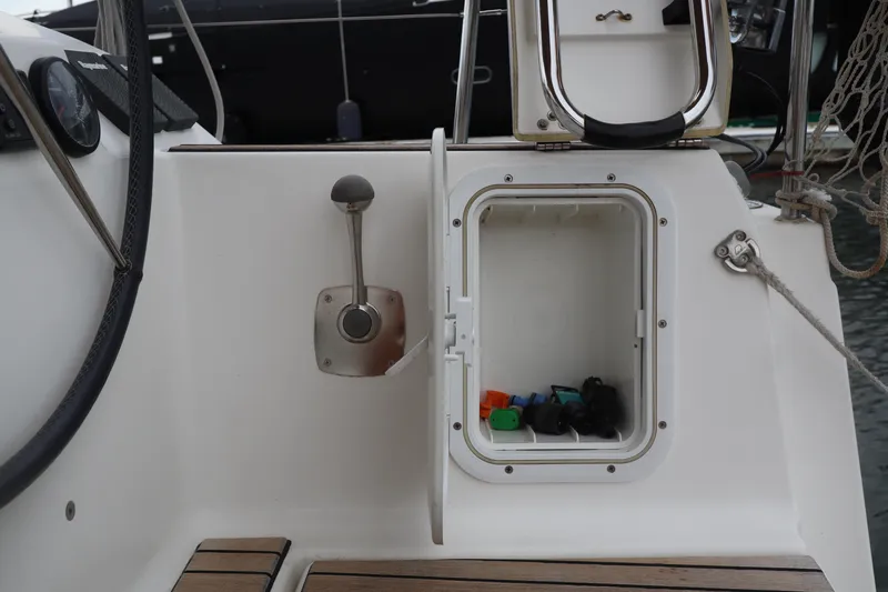  Yacht Photos Pics 2016 Dufour 382 Grand Large yacht cockpit storage compartment with open hatch.