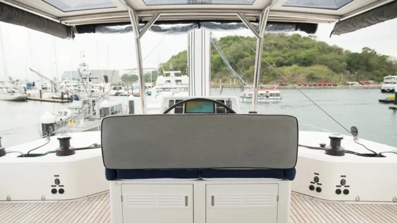 Kailua Yacht Photos Pics Helm of 2018 Sunreef 74C yacht docked at marina, featuring modern navigation equipment.