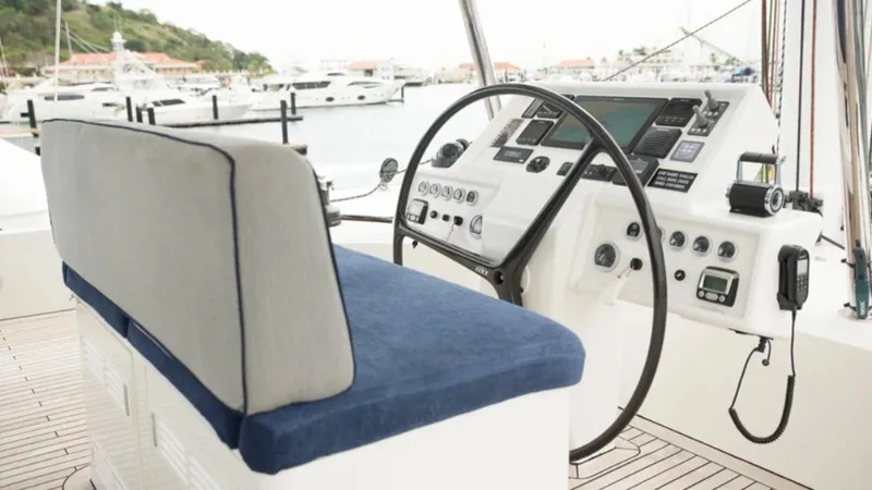 Kailua Yacht Photos Pics Helm of 2018 Sunreef 74C yacht with navigation controls and seating.