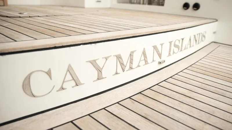 Kailua Yacht Photos Pics Sunreef 74C yacht deck with "Cayman Islands" inscription, 2018 model.