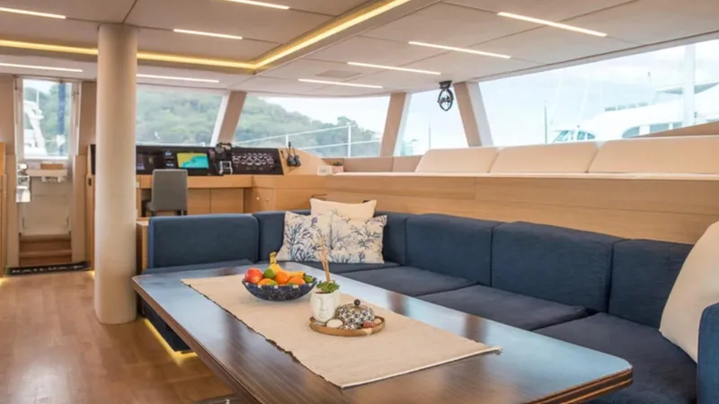 Kailua Yacht Photos Pics Luxurious interior of 2018 Sunreef 74C yacht with elegant seating and decor.