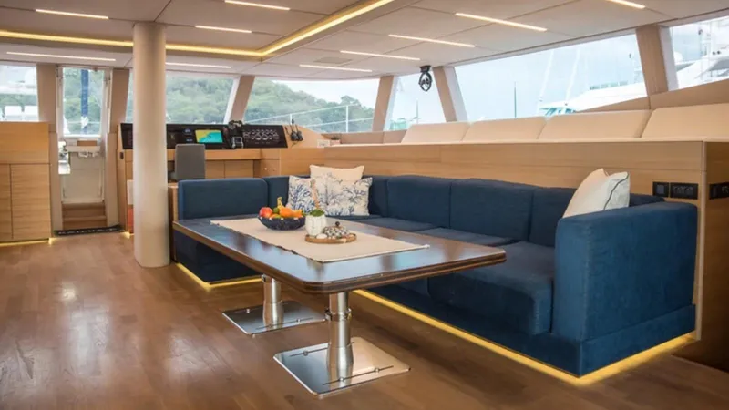 Kailua Yacht Photos Pics Luxurious interior of 2018 Sunreef 74C yacht with elegant seating and modern design.