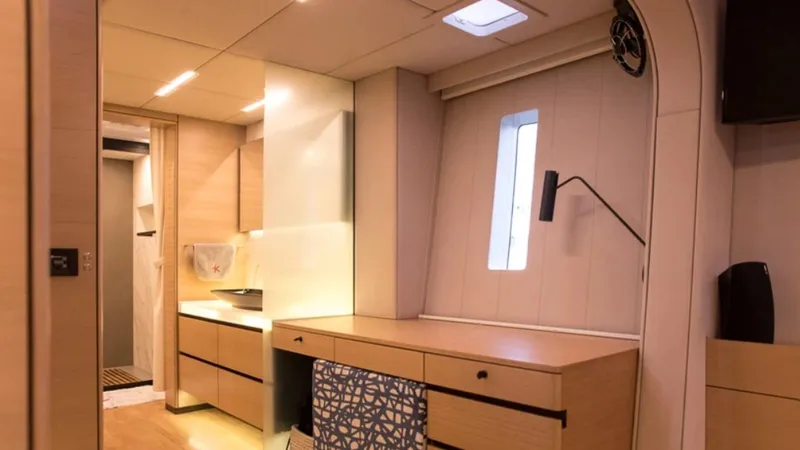 Kailua Yacht Photos Pics Luxurious interior of 2018 Sunreef 74C yacht with modern furnishings and ambient lighting.