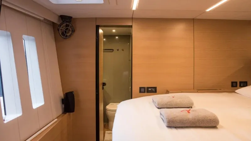 Kailua Yacht Photos Pics Luxurious cabin interior of 2018 Sunreef 74C yacht with ensuite bathroom.