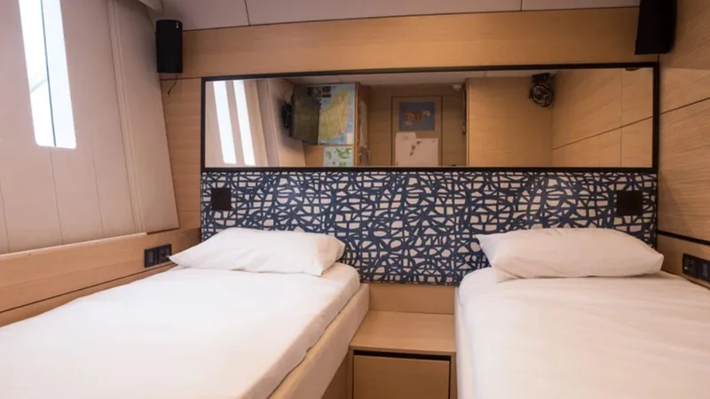 Kailua Yacht Photos Pics Luxurious twin cabin interior of 2018 Sunreef 74C yacht with modern decor.