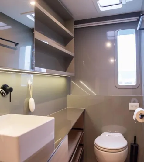 Kailua Yacht Photos Pics Modern bathroom in 2018 Sunreef 74C yacht with sleek design and ample storage.
