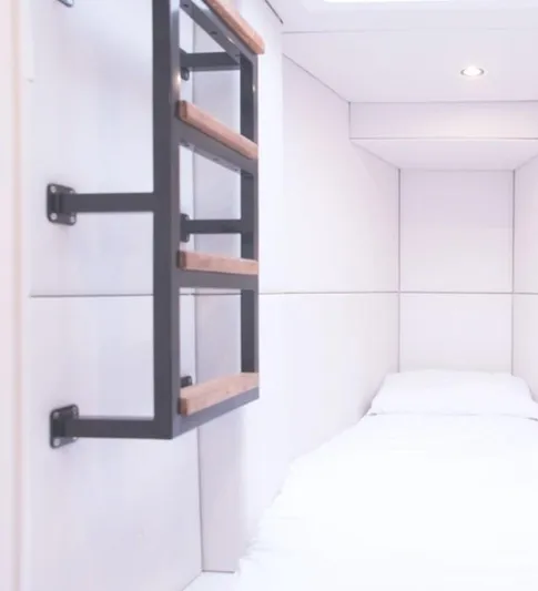 Kailua Yacht Photos Pics Interior cabin of 2018 Sunreef 74C yacht with minimalist design and ladder.