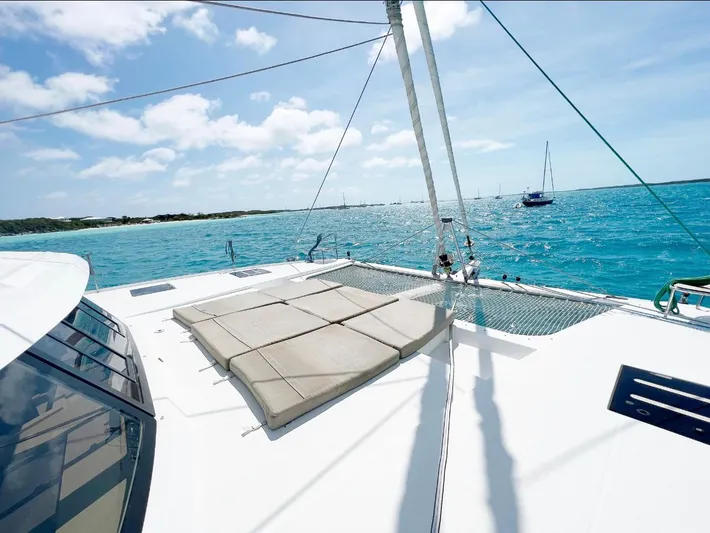  Yacht Photos Pics Fountaine Pajot Saona 47 catamaran on blue sea, 2018 model.
