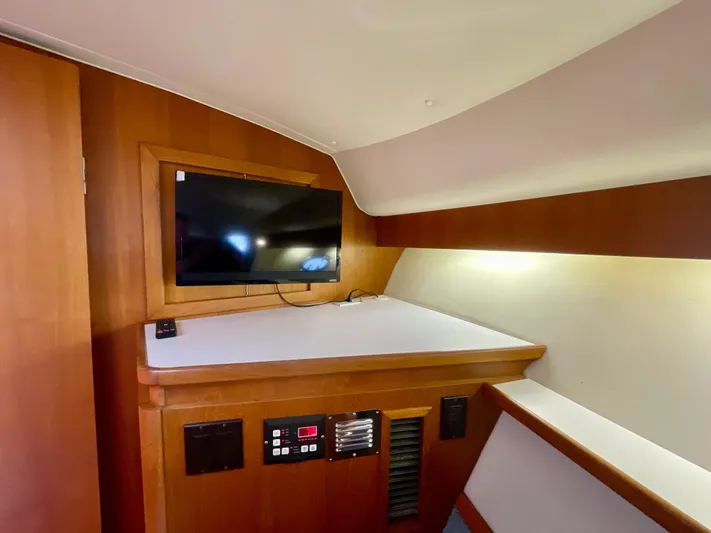 Gina Marie Yacht Photos Pics 1997 Tiara Yachts 3700 Open interior with TV and control panel.