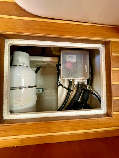 Gina Marie Yacht Photos Pics 1997 Tiara Yachts 3700 Open engine compartment with visible components and wiring.