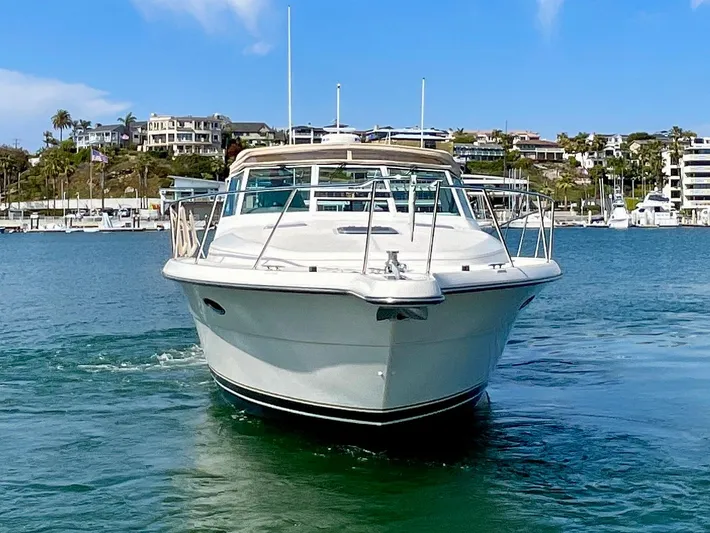 Gina Marie Yacht Photos Pics 1997 Tiara Yachts 3700 Open cruising in a scenic marina setting.