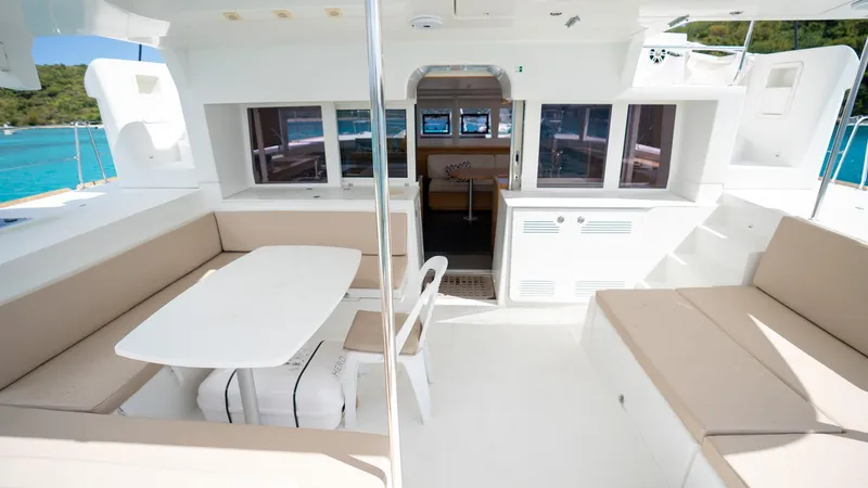 Altair Yacht Photos Pics 2018 Lagoon 450 F catamaran interior with spacious seating and dining area.