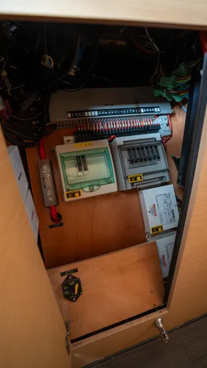 Altair Yacht Photos Pics Electrical panel inside 2018 Lagoon 450 F yacht, showcasing wiring and components.