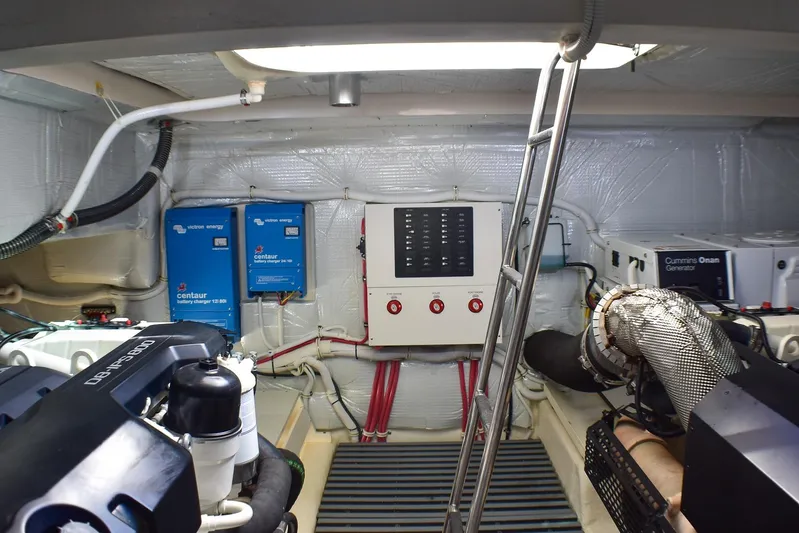  Yacht Photos Pics Engine room of 2019 Tiara Yachts C49 Coupe with electrical systems and generator.