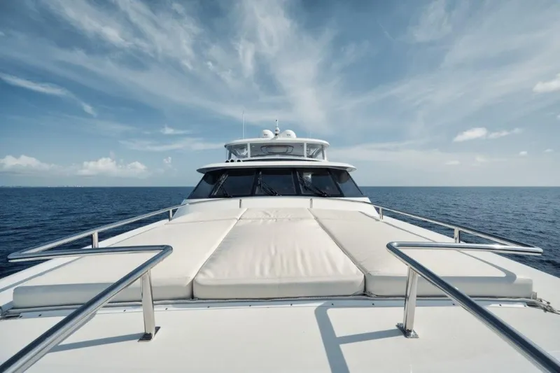 Island Girl Yacht Photos Pics Luxury yacht Westport 112 cruising on open sea under clear skies, 2002 model.