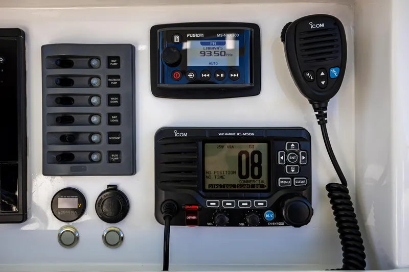 Hot Rod Yacht Photos Pics Control panel of a 2005 French Yachts 34 Center Console with radio and switches.