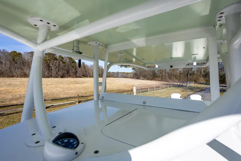 Hot Rod Yacht Photos Pics 2005 French Yachts 34 Center Console, view from deck overlooking a rural landscape.