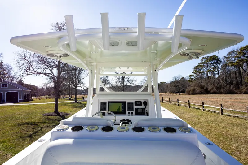 Hot Rod Yacht Photos Pics 2005 French Yachts 34 Center Console, helm view, featuring modern controls and spacious design.