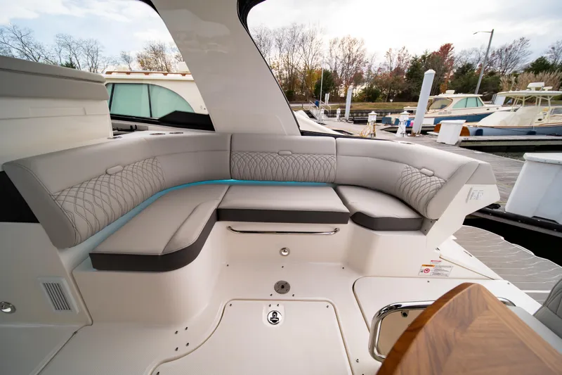 Nauti Tiger Yacht Photos Pics Luxurious seating area on 2024 Sea Ray Sundancer 370 yacht at marina.