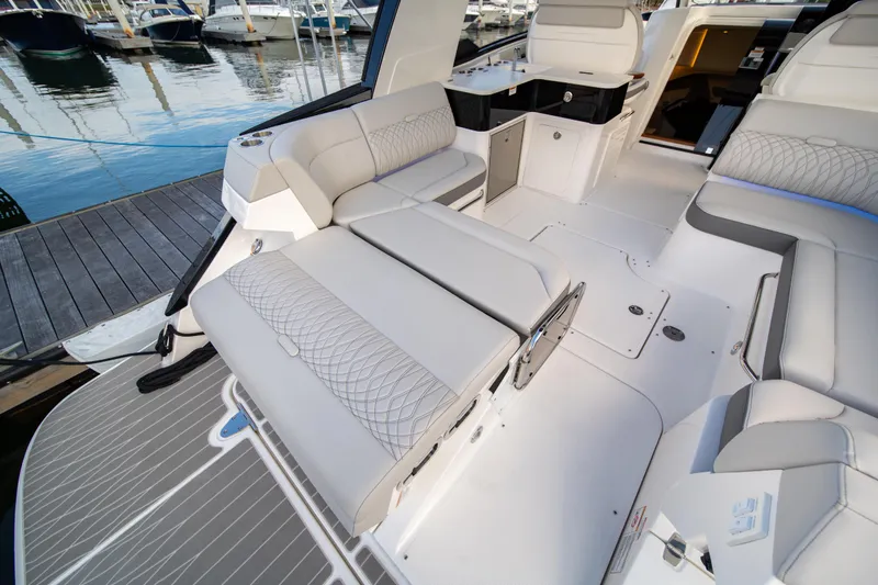 Nauti Tiger Yacht Photos Pics Luxurious 2024 Sea Ray Sundancer 370 yacht interior with elegant seating and modern design.