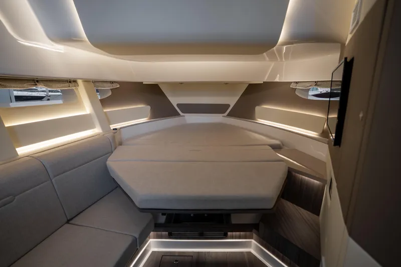 Nauti Tiger Yacht Photos Pics 2024 Sea Ray Sundancer 370 cabin interior with modern lighting and comfortable seating.