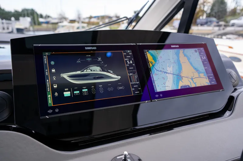 Nauti Tiger Yacht Photos Pics 2024 Sea Ray Sundancer 370 dashboard with dual Simrad navigation displays.