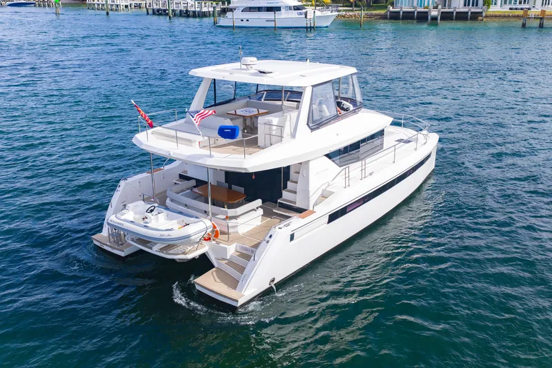 Better Now Yacht Photos Pics 2023 Leopard 46 Powercat yacht cruising on blue water, showcasing modern design and luxury.