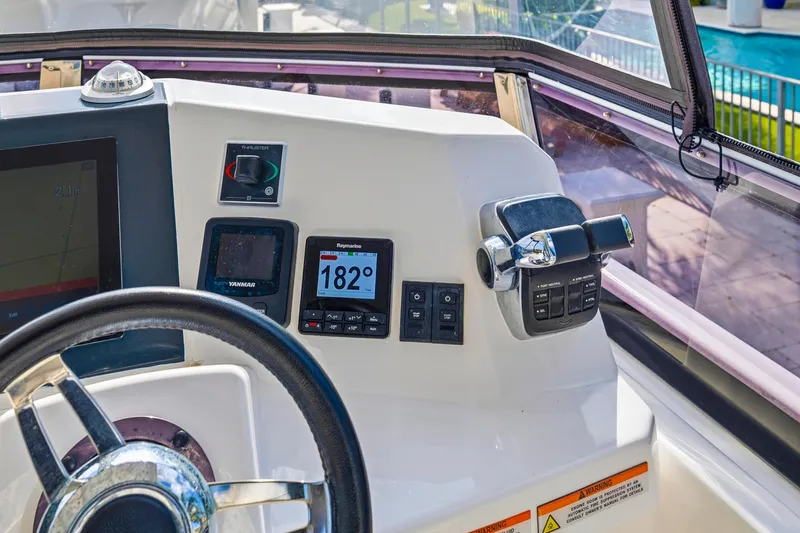 Better Now Yacht Photos Pics Helm of 2023 Leopard 46 Powercat with navigation instruments and controls.