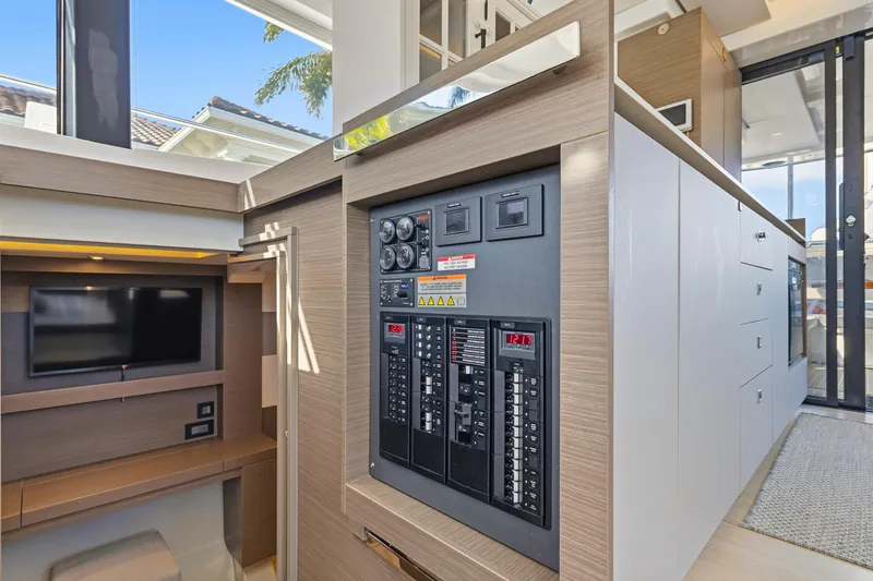 Better Now Yacht Photos Pics 2023 Leopard 46 Powercat interior with control panel and modern design elements.