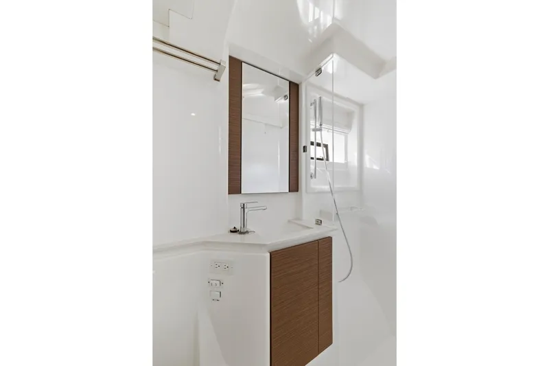 Better Now Yacht Photos Pics Modern bathroom interior on 2023 Leopard 46 Powercat yacht, featuring sleek design and fixtures.