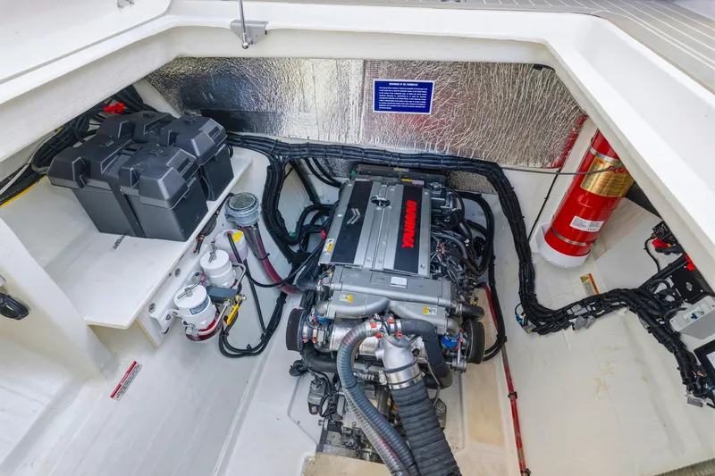 Better Now Yacht Photos Pics Engine room of 2023 Leopard 46 Powercat with Yanmar engine and fire extinguisher.