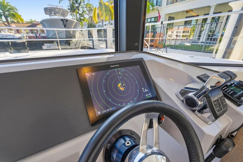 Better Now Yacht Photos Pics Helm of 2023 Leopard 46 Powercat with navigation display and controls.