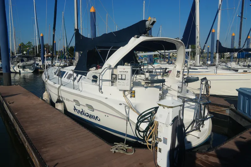 Andiamo Yacht Photos Pics Sailboat docked at marina, Hunter 410 model, 1998, named Andiamo.