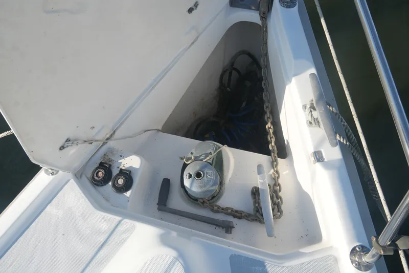 Andiamo Yacht Photos Pics Anchor locker of 1998 Hunter 410 sailboat with chain and winch.