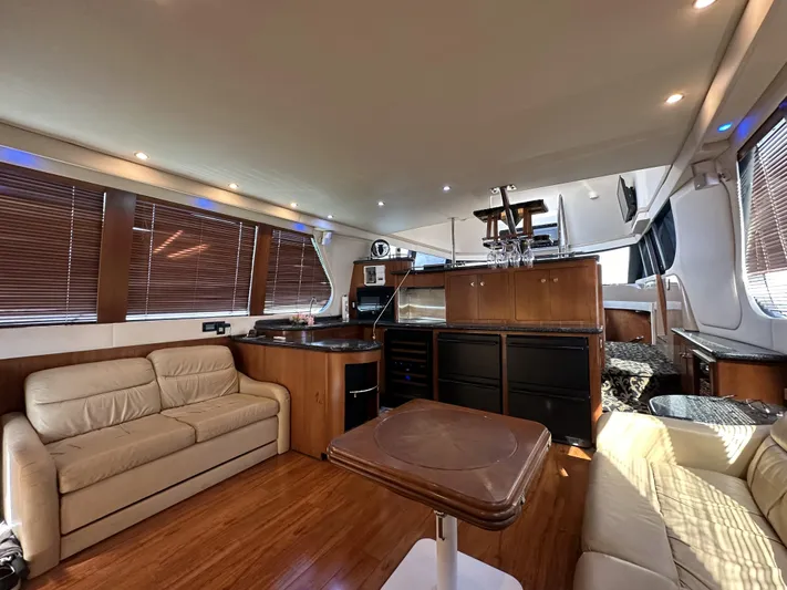 Bootlegger Yacht Photos Pics Luxurious interior of 1999 Carver 530 Voyager Pilothouse yacht with elegant furnishings.