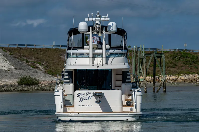 You Go Girl! Yacht Photos Pics Fairline Squadron 52 yacht from 2000 on water, rear view.