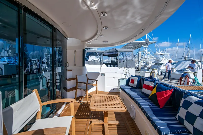 You Go Girl! Yacht Photos Pics Luxurious 2000 Fairline Squadron 52 yacht deck with seating and nautical decor.