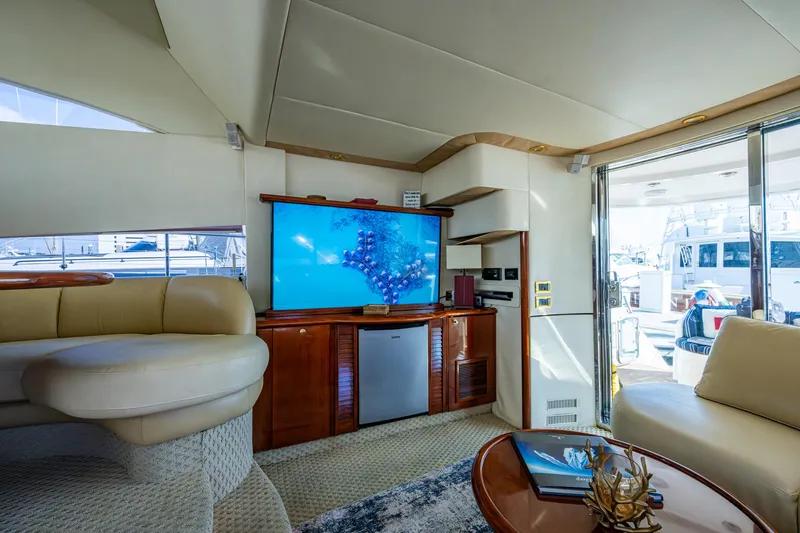 You Go Girl! Yacht Photos Pics Luxurious interior of 2000 Fairline Squadron 52 yacht with modern amenities and elegant design.