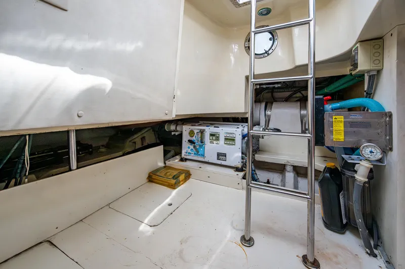 You Go Girl! Yacht Photos Pics Engine room of 2000 Fairline Squadron 52 yacht with ladder and equipment.